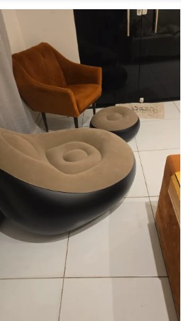 Customer photo showing the inflatable lounge chair and ottoman in her home